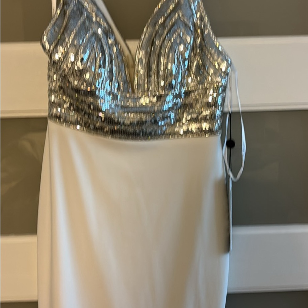 Ivory and silver beading dress. Never worn. Size 2.